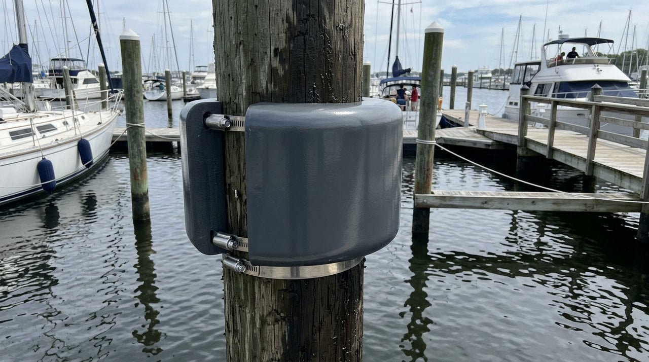 Protection Against Pilings and Dock Edges Boat hull protected from wooden pilings by a foam collar
