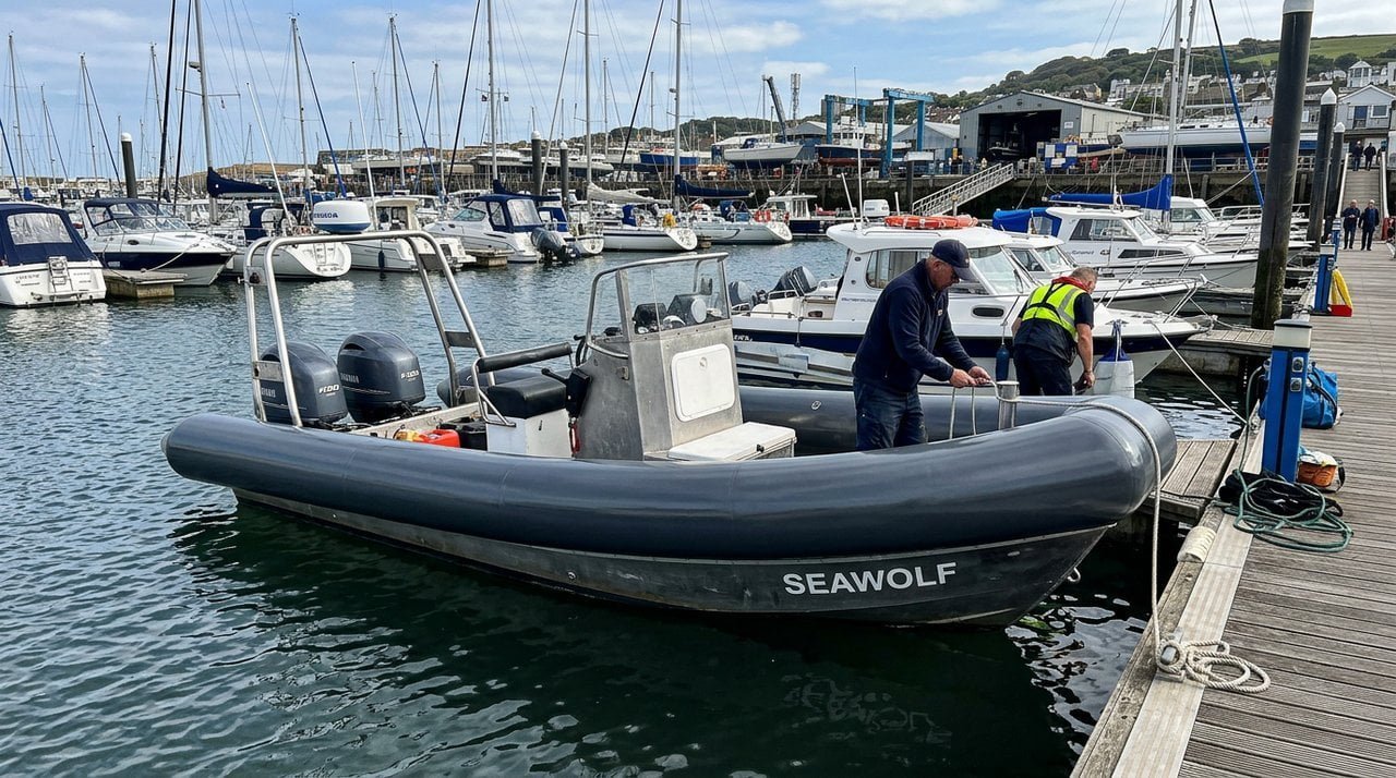 Heavy duty work boat with foam collar