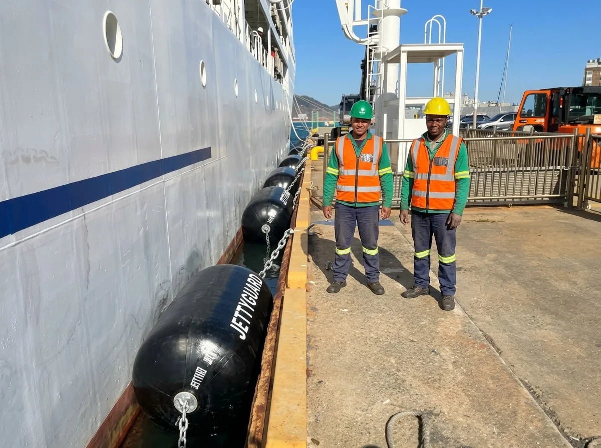 Non-marking foam fenders at cruise berth Cruise vessel docked with foam fenders showing no hull marks