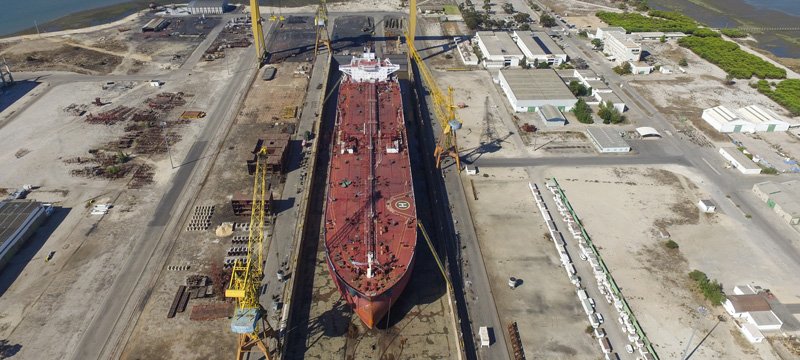 Fender system installed along shipyard dry dock wall