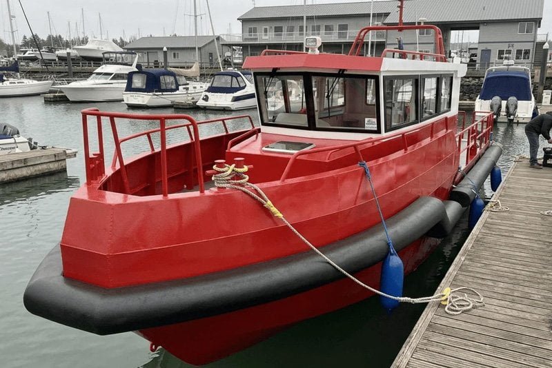 Custom foam fender collar fitted on patrol boat hull
