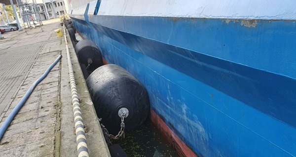 Foam fenders deployed during offshore ship-to-ship transfer