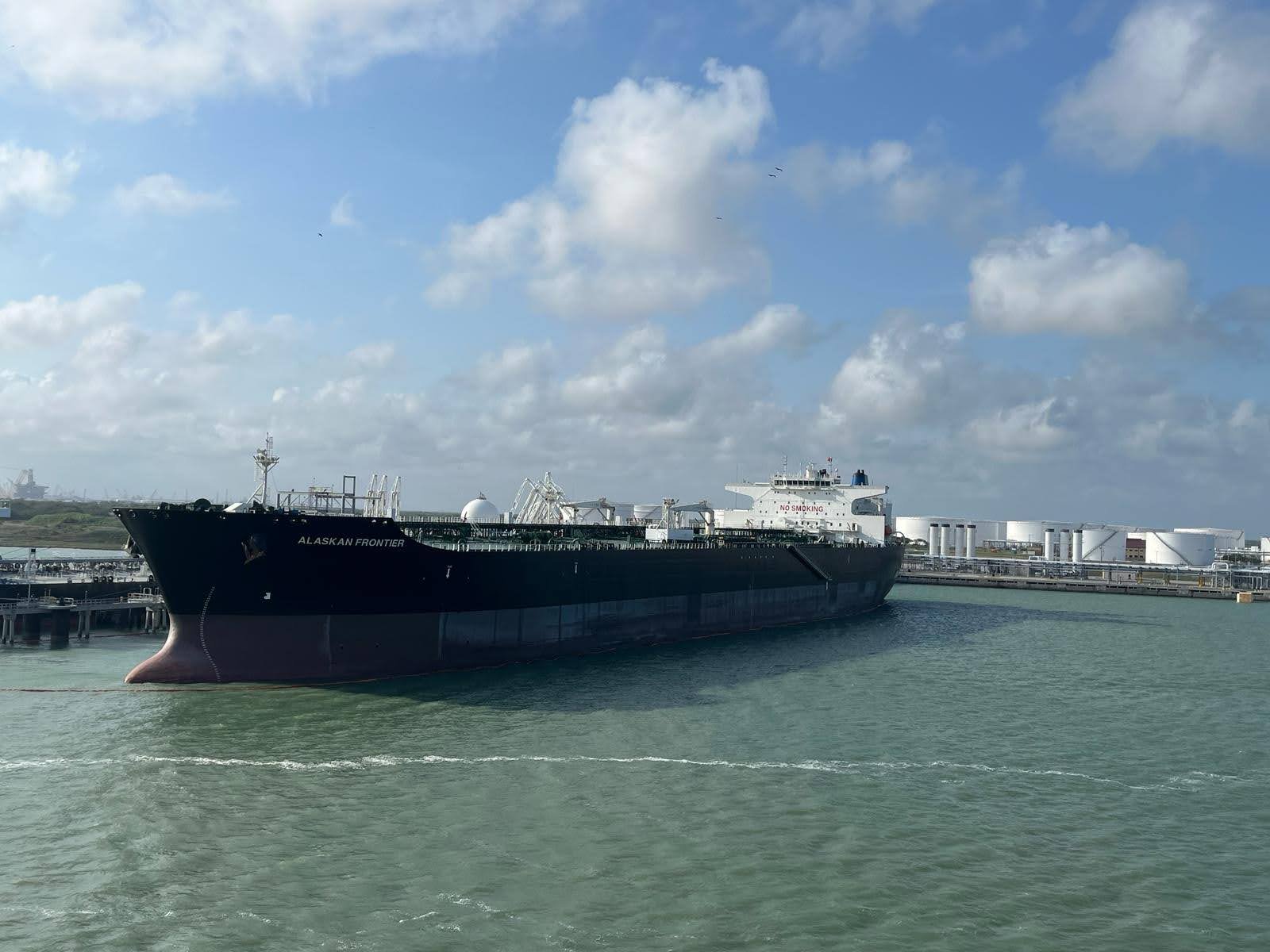 Oil vessel alongside a terminal berth structure