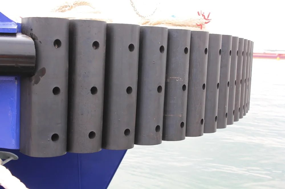 D fenders mounted on a working tugboat