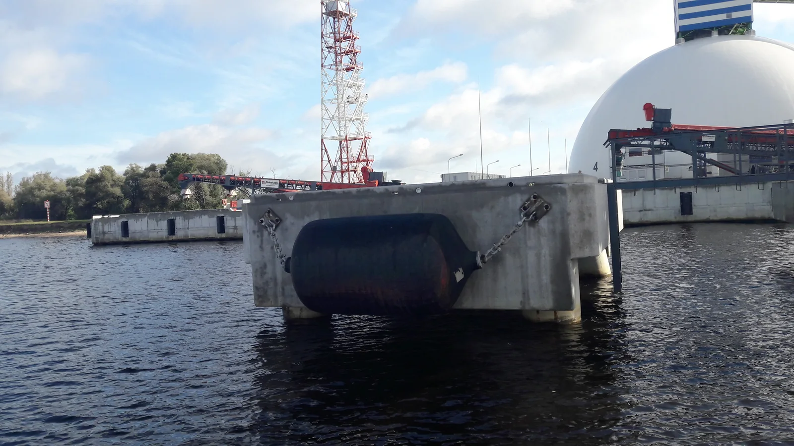 Marine dolphin structure used in a berthing and mooring layout
