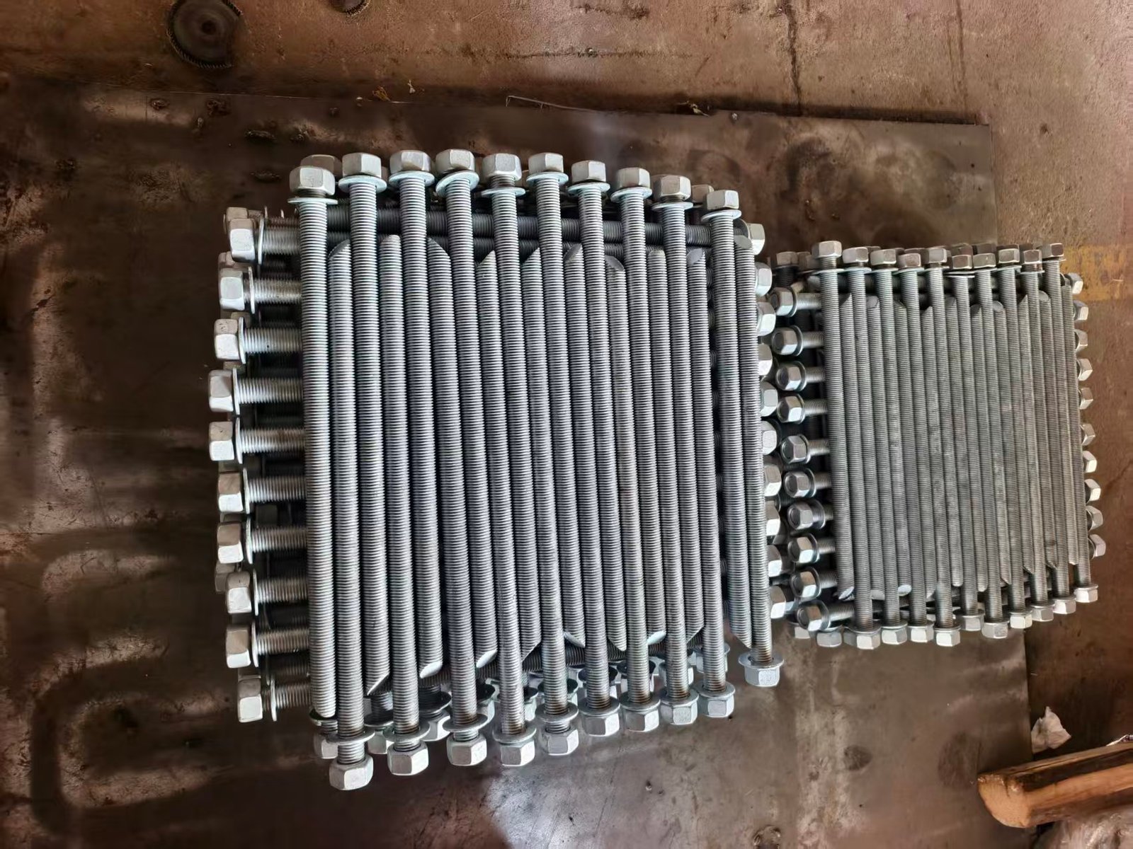 Anchor rods prepared for a bollard installation package