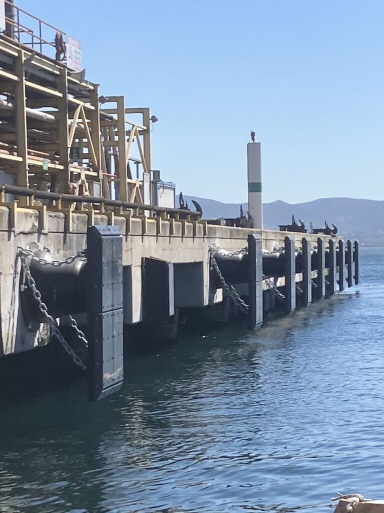 Fixed cone fender system installed on a quay wall